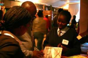 4th-year Gitwa speaks with Community Day visitors